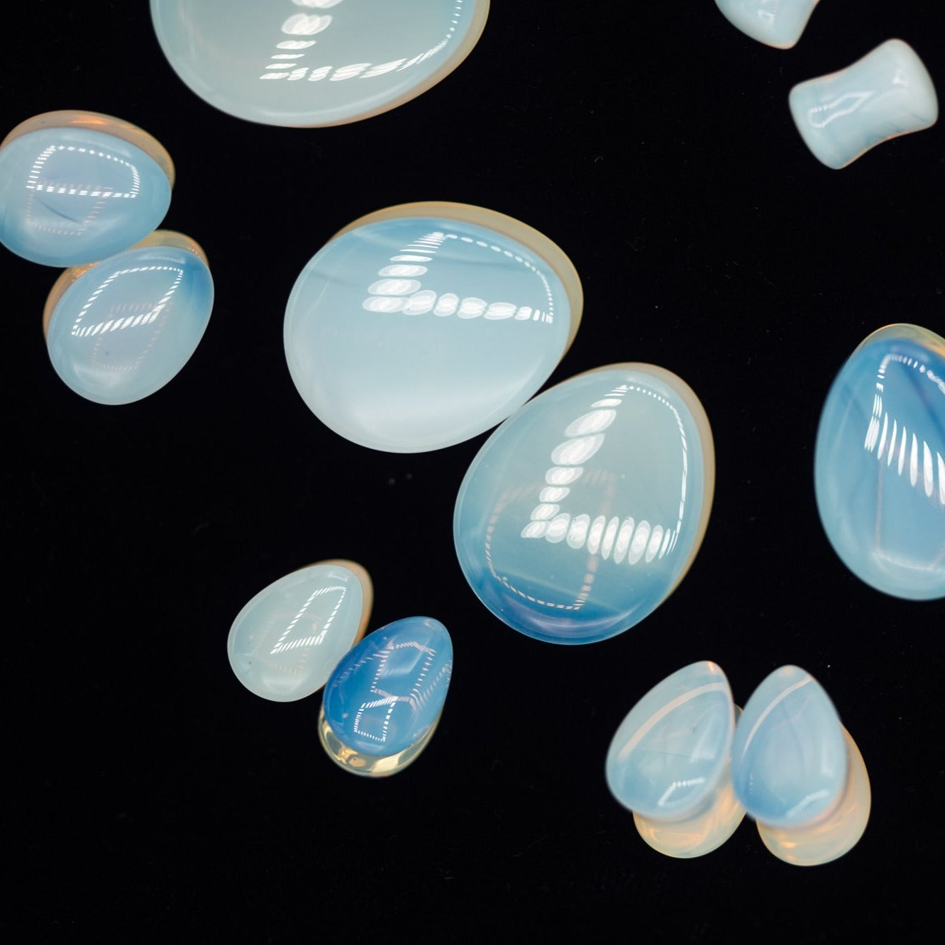 Teardrop Opalite Double Flared Plugs, Pair - 70 Knots